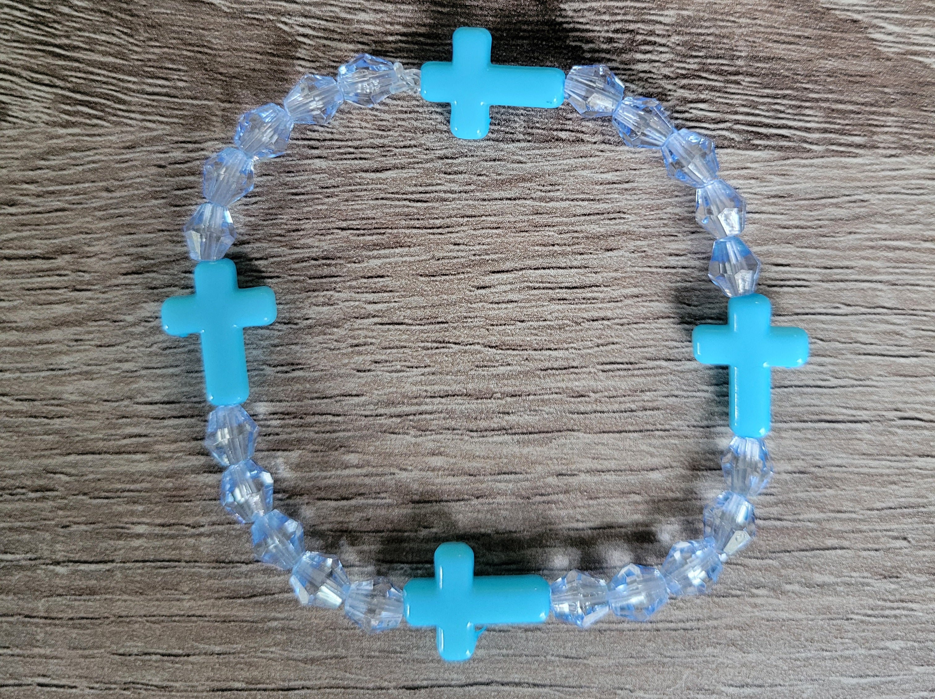 LIGHT BLUE CRYSTAL CROSS BRACELET