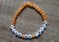 ORANGE LIVE BY FAITH BRACELET